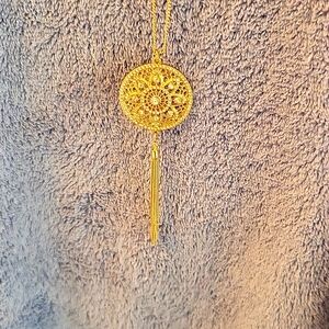 Gold tone necklace